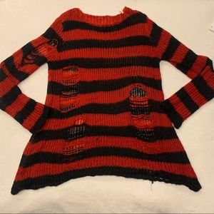 Oversized distressed black and red sweater